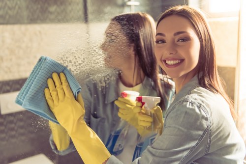 Local cleaning professional maintaining a fresh and organized Notting Hill space